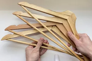 He puts 4 hangers by his bed for the most amazing bedroom idea