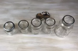 She took the centers out of 5 mason jars to make her counter more beautiful