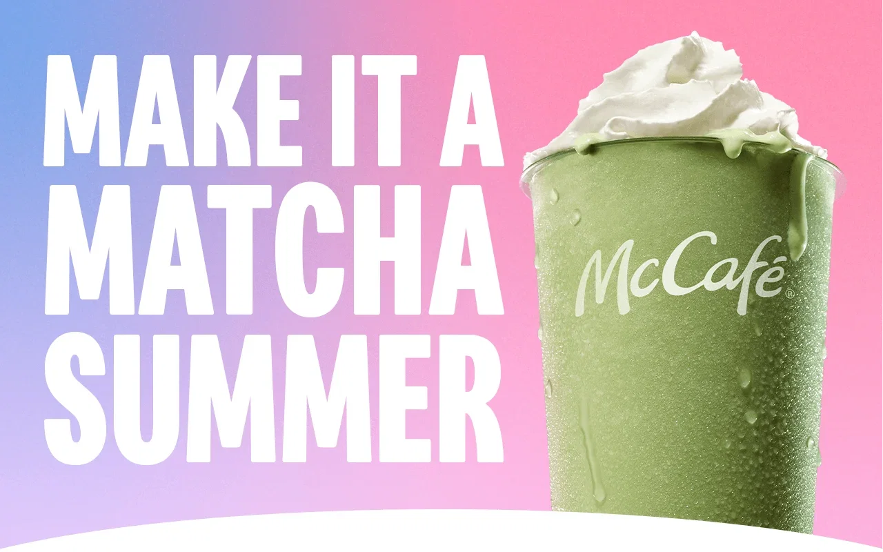 An icy, refreshing matcha latte on a blue-pink gradient background. Large white text reads 'Make it a matcha summer'.