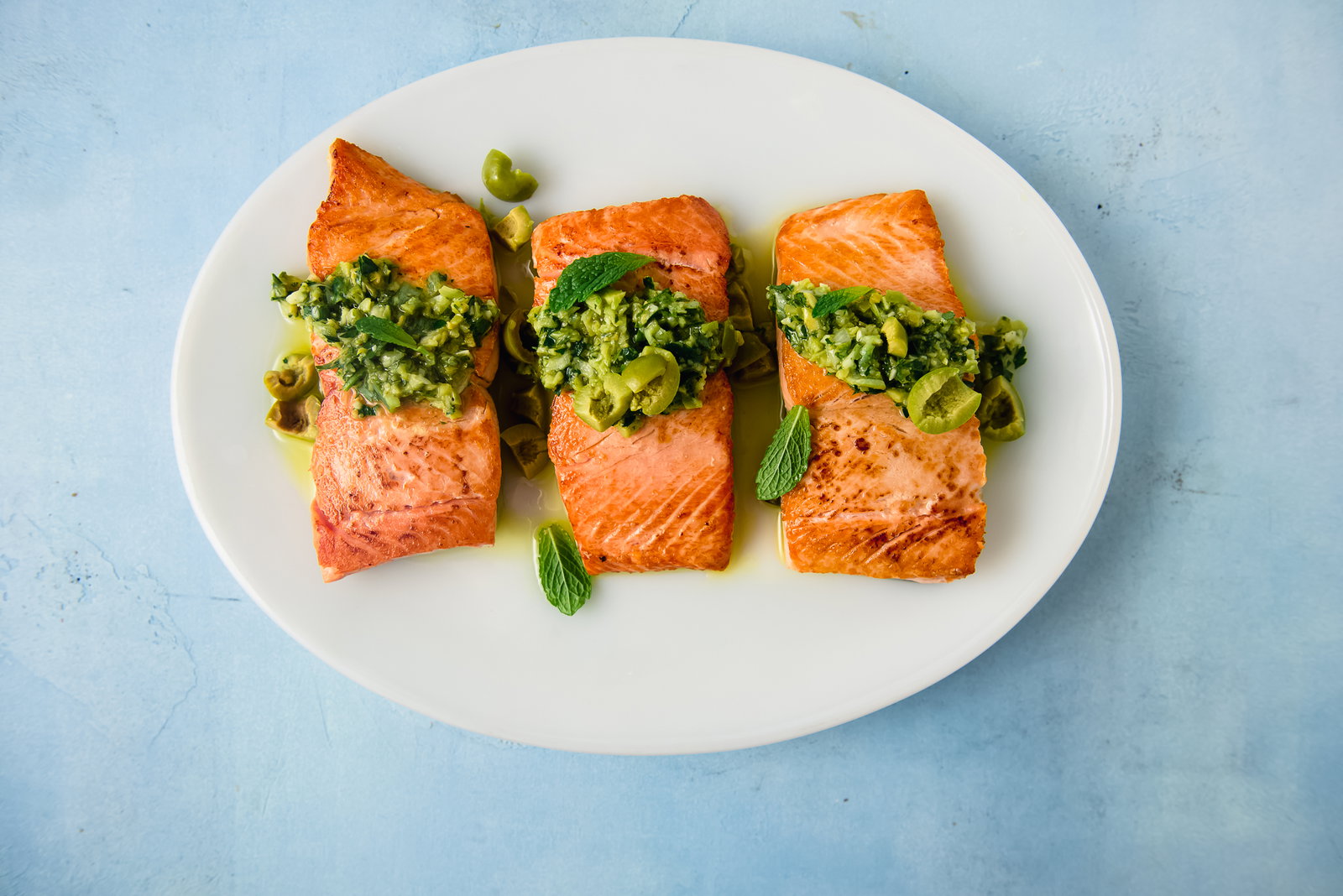 3 portions of coho salmon with olive tapenade