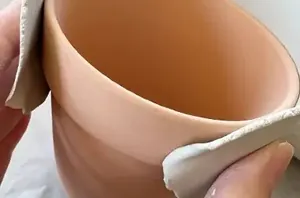 She wraps clay around terracotta pots for this remarkable upgrade