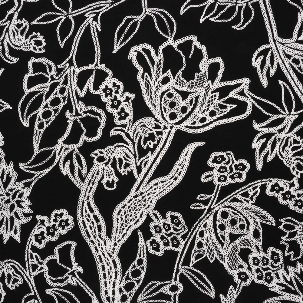 Image of Stretch Polyester Tricot - Black and White Chain Stitch Flowers - Designer Deadstock