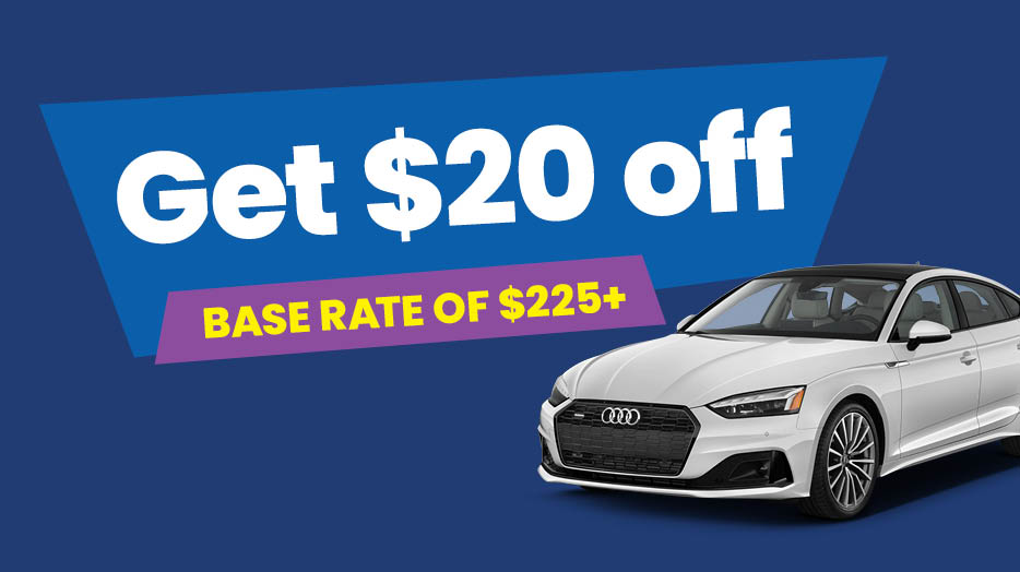 Get $20 off base rate of $225+. White Audi sedan against a blue background.