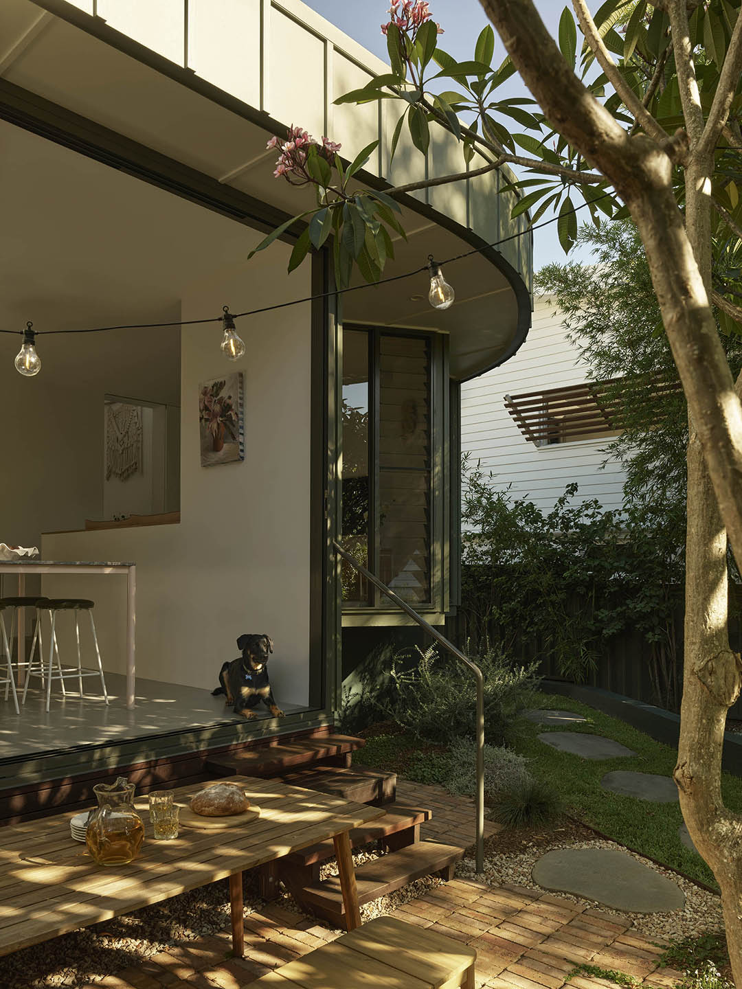 Before & After: A Brisbane Cottage With Historic Charm in the Front, Modern Curves in the Back