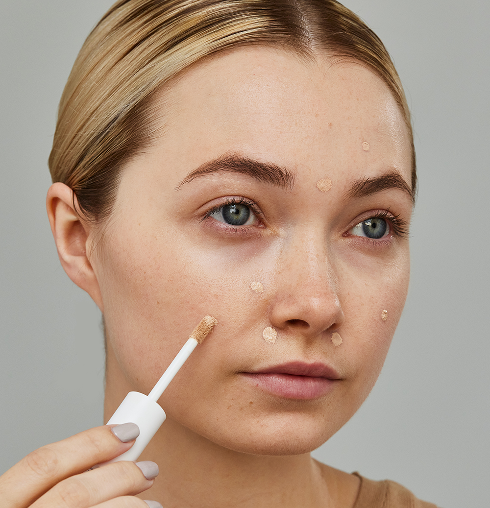 image of model with PureMatch Concealer 