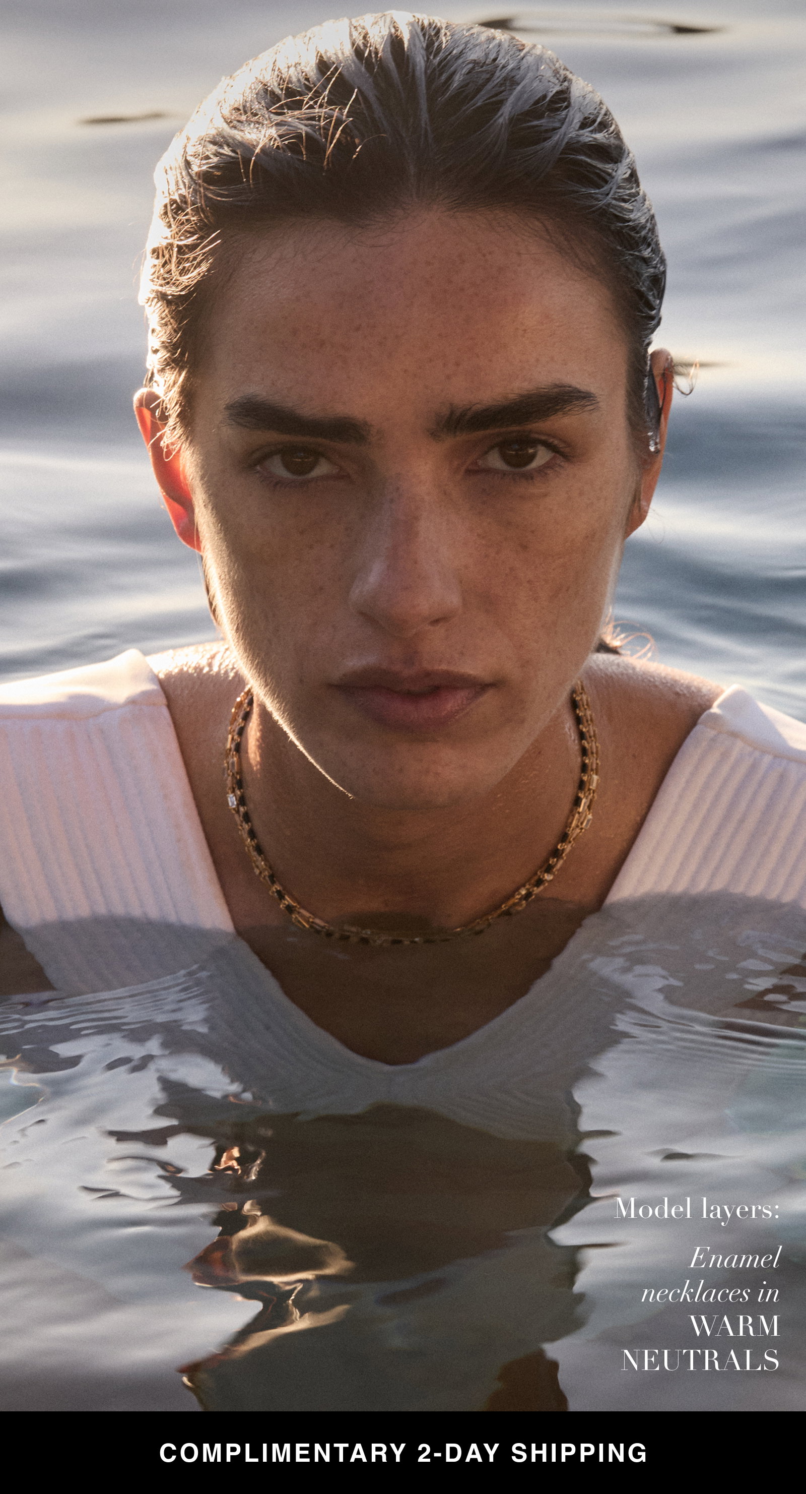 Model layers: Enamel necklaces in WARM NEUTRALS. COMPLIMENTARY 2-DAY SHIPPING.
