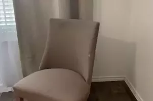 Instead of using a canvas, she grabs an old chair for this crazy cool paint update