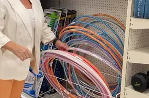 The beautiful reason she hangs 3 hula hoops in her garden this season