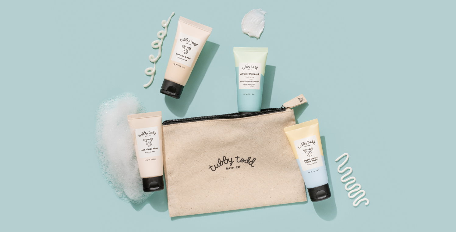 Tubby Todd travel kit featuring travel sizes of wash, lotion, all over ointment, and diaper paste in a canvas zipper bag