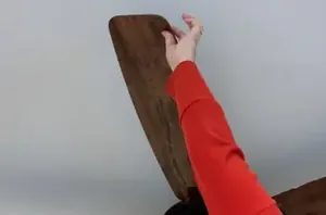 Stick felt pads to the back of your ceiling fan for a really clever hack