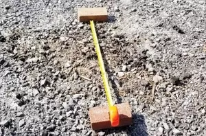 She lays 2 bricks in her yard—$20 later, she has this amazing update