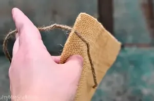 Put a stick through a piece of burlap for an unexpectedly cute warm weather idea