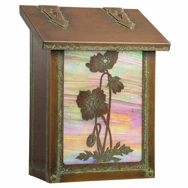 A brass mailbox with poppy artwork.