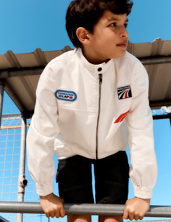 Boy wearing Formula 1® Jacket in Ecru