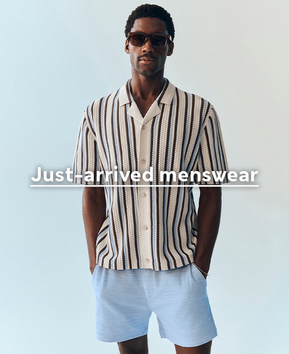 Model wearing Cotton Textured Striped Knitted Polo Shirt in Blue Mix