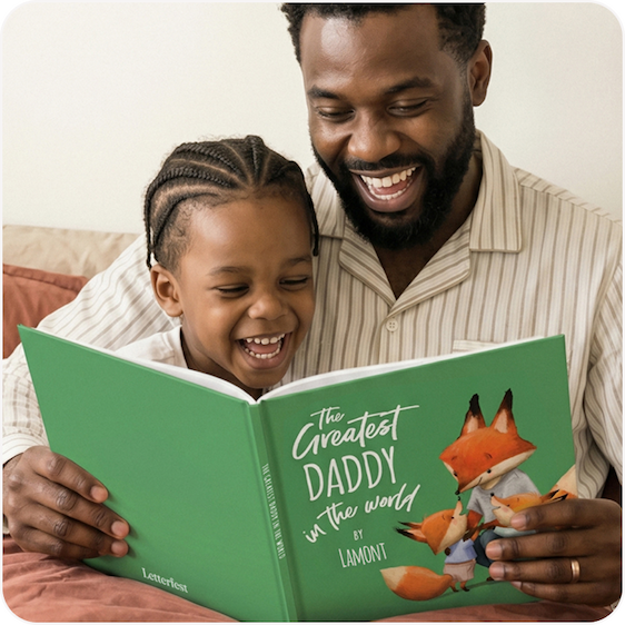 A father and young child laughing together while reading a personalised "The Greatest Daddy in the World" book