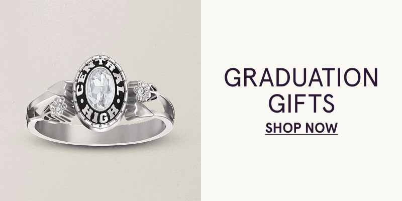 Silver-toned class ring with oval center stone & 