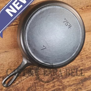 Tougher to find!  1930's era Griswold #7 Cast Iron Skillet with Heat Ring, 754.  Similar to the Victor design.  Great pan!