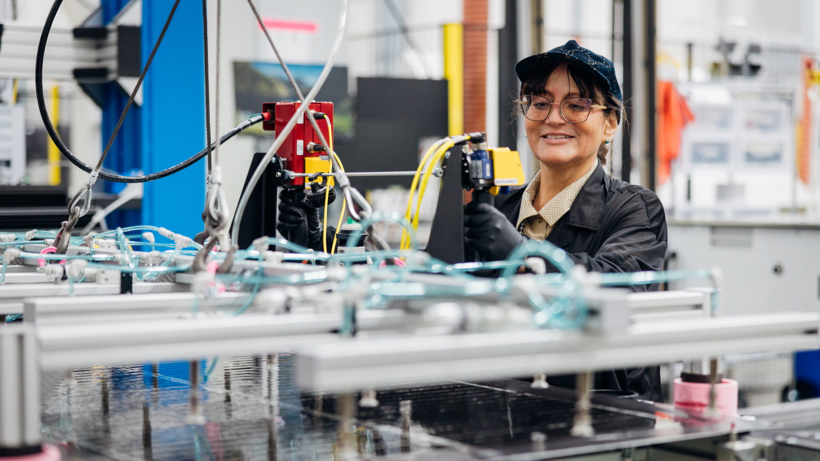 Employee working with robotics.