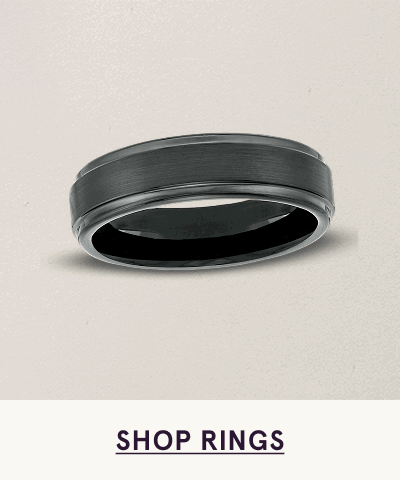 A wide, modern band with matte black finish & polished beveled edges. Click here to shop rings