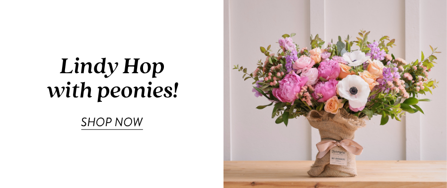 Product feature for “Lindy Hop with peonies,” showing a burlap-wrapped bouquet with pink, peach, white, and green flowers displayed against a light background. Text on the left reads “Lindy Hop with peonies!” with a “Shop Now” link.