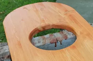 He turns a plank of wood into pretty outdoor seating that's so much more than a bench