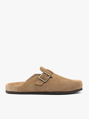 Brown suede slip-on clog with buckle and cork sole on white background.