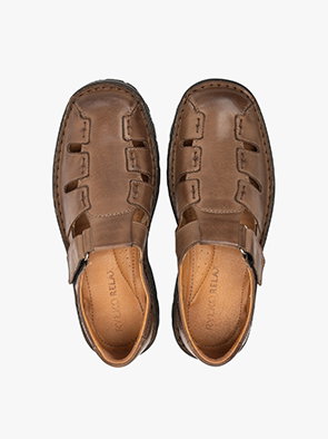 Top view of brown leather men's sandals with closed toe design on white background.
