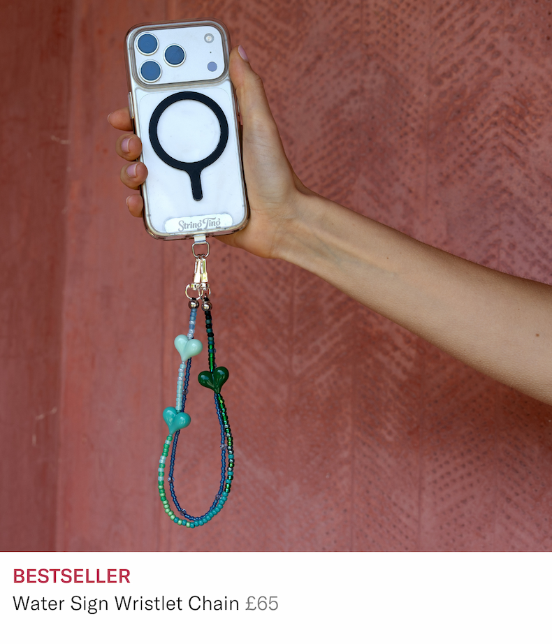 Hand holding water sign wristlet chain 