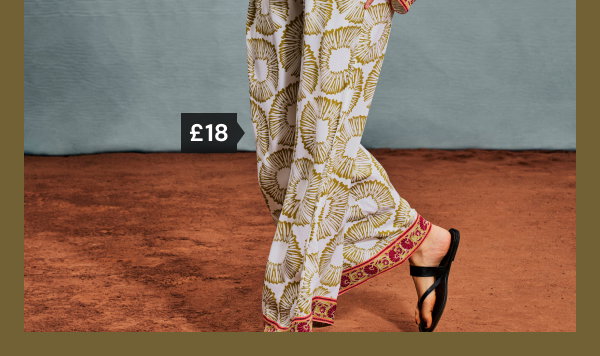 Cream printed wide leg trousers £18.