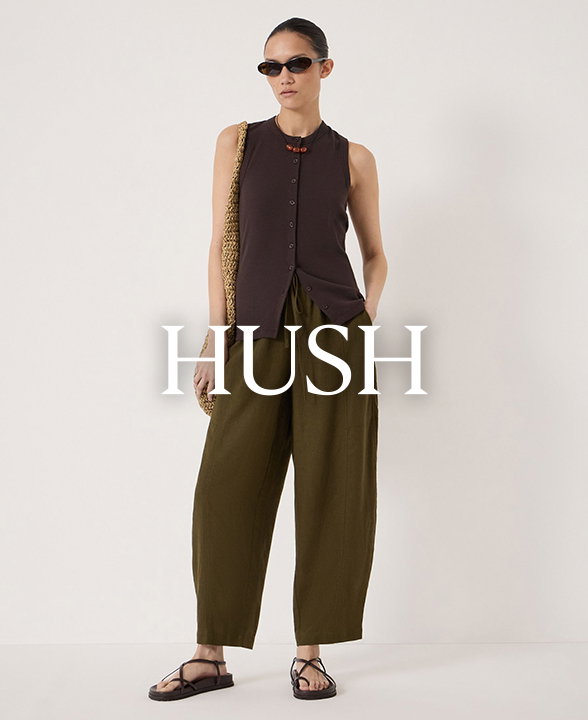 Model wearing Hush Linen Blend Barrel Leg Trousers in Khaki with a Button-up Vest Top in Brown