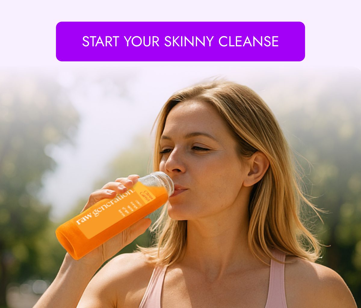 Woman drinking a juice from a bottle, with a sunny background.