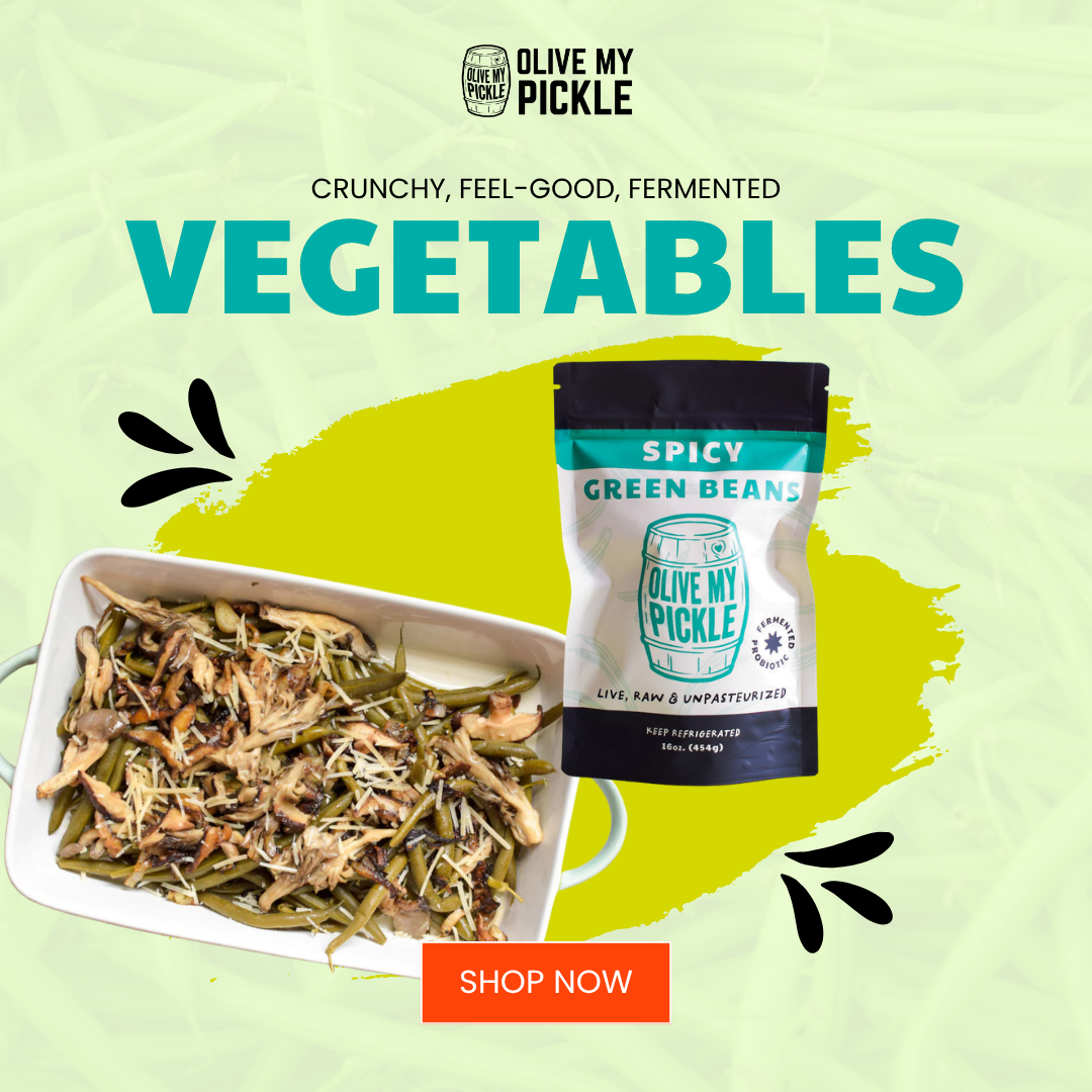 Olive My Pickle Spicy Green Beans bag next to a white dish of cooked green beans with mushrooms and shredded cheese. 'Crunchy, Feel-Good, Fermented Vegetables'