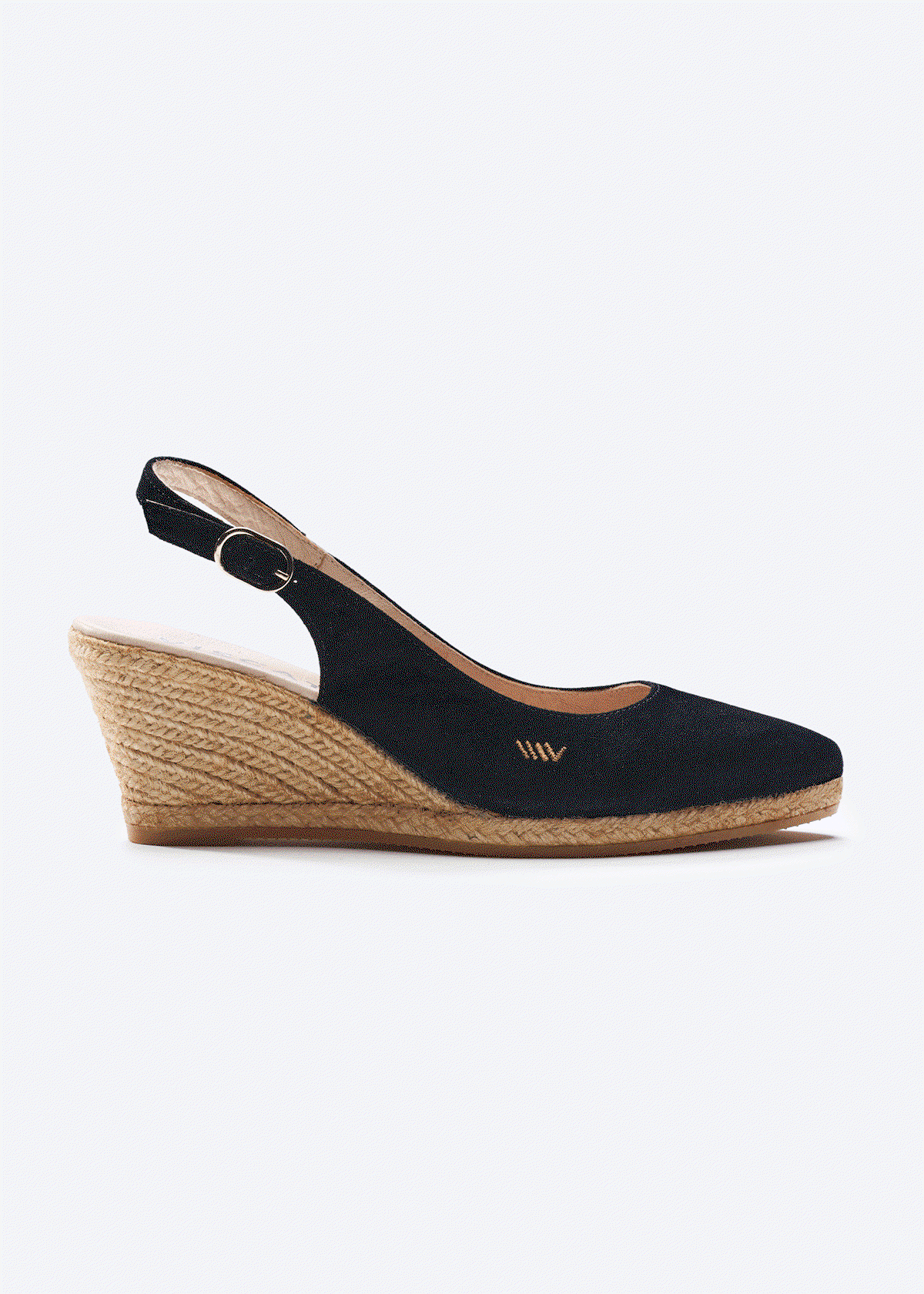 Black Palomera canvas slingback wedge espadrilles with a closed pointed toe, adjustable buckle strap, and natural jute wedge, handmade in Spain by Viscata.