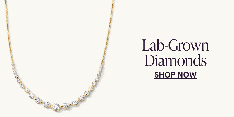A gold necklace with graduated diamonds. Click here to shop lab grown diamonds