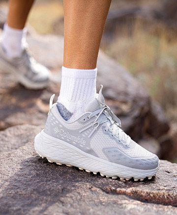 Women's white and gray sneakers.