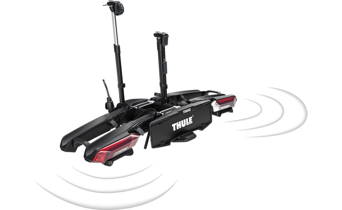 Der Thule Kupplungsträger mit Symbolen für das Park Secure System