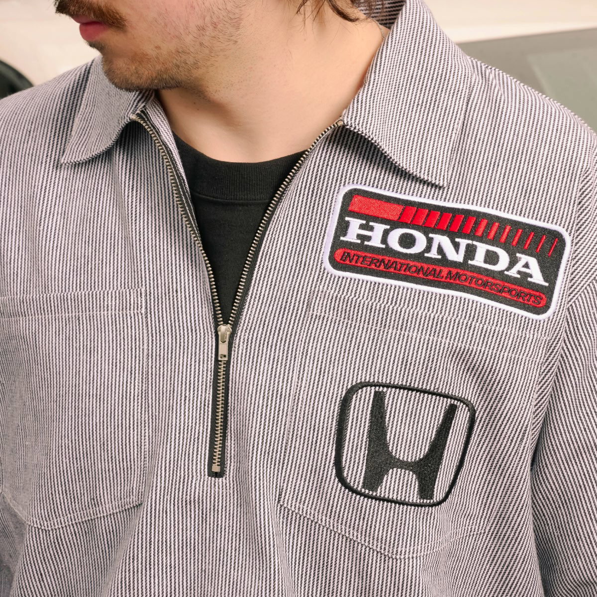 Shop Honda Racing | A quarter zip gray shirt with the Honda logo