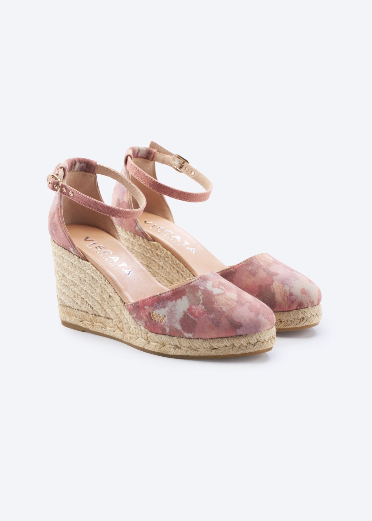 Lycra Pink Estartit espadrille wedges with floral fabric, closed rounded toes, adjustable ankle straps, and natural jute wedges, handmade in Spain by Viscata.