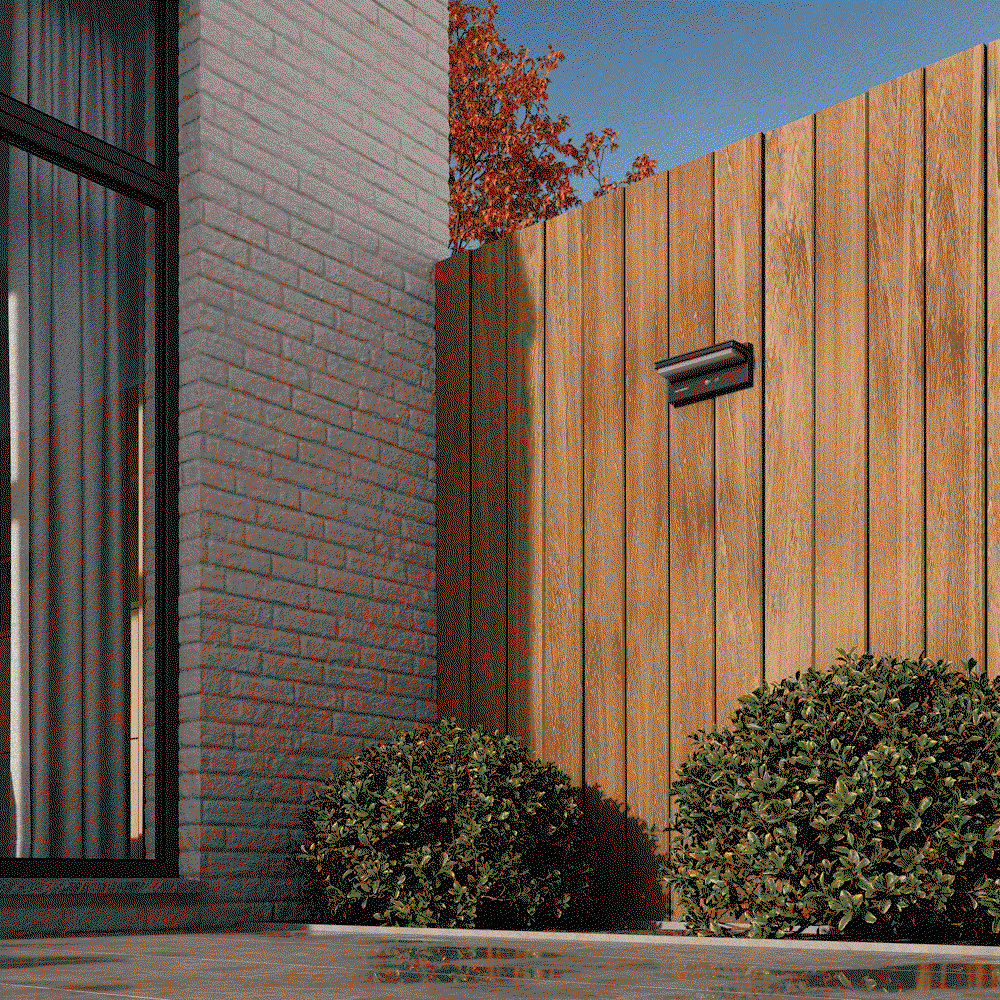 GIF of fence lighting in daylight and in the dark.