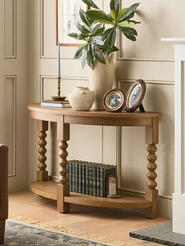 9 Demi-Lune Tables for That Weird Spot You’ve Never Known What to Do With