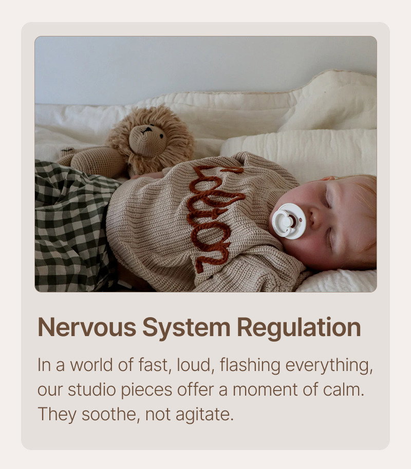 Baby resting with a plush toy on a blanket, accompanied by text about nervous system regulation and calming sensory experiences.