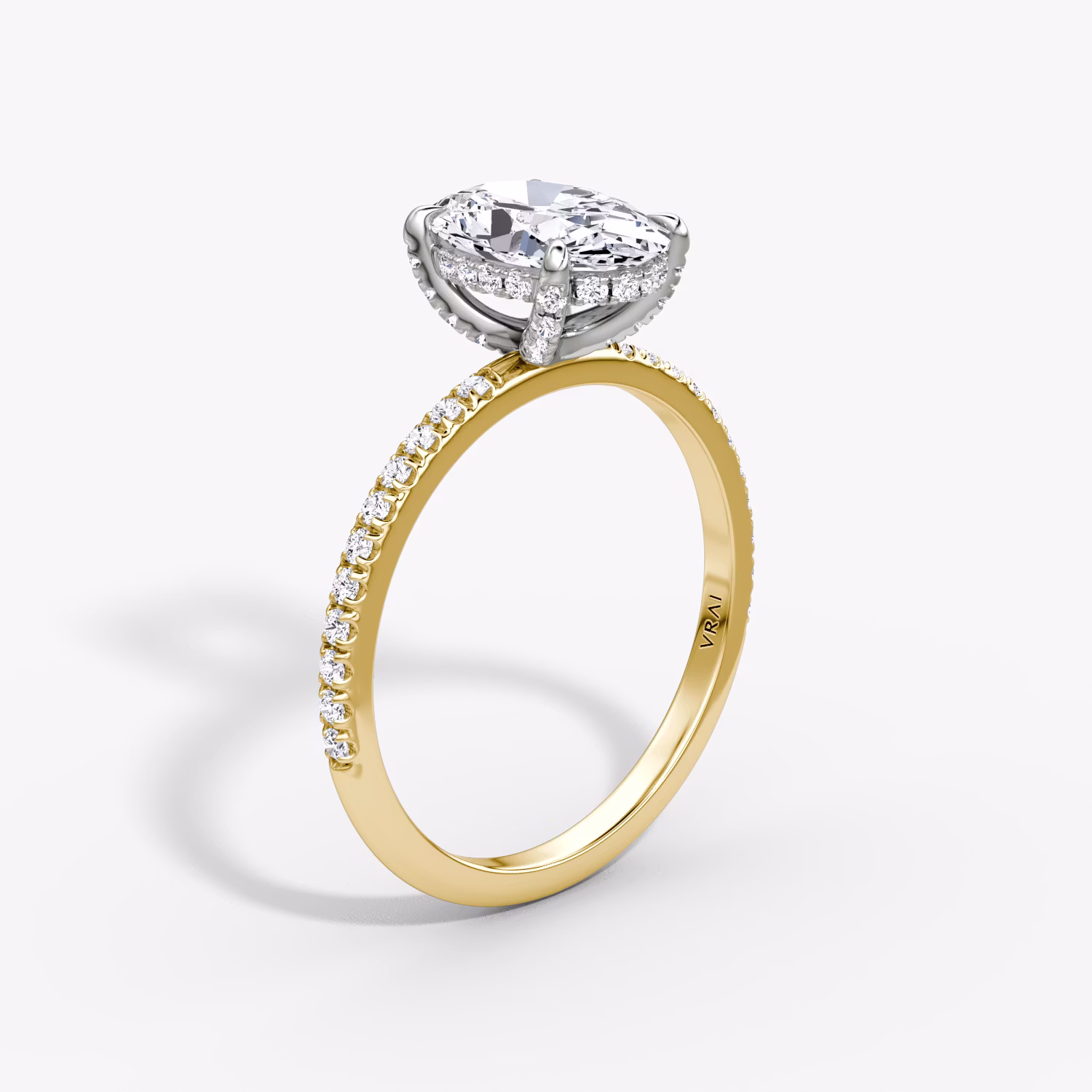 The Classic Hidden Halo Oval Yellow Gold and Platinum Engagement Ring