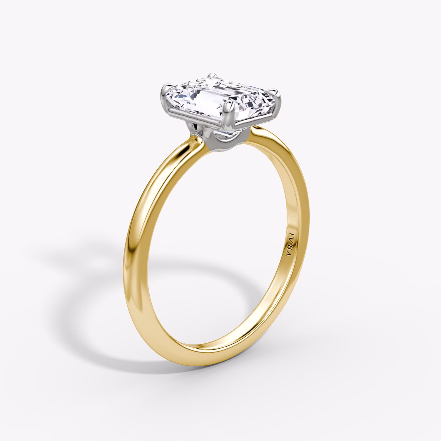 The Signature Emerald Yellow Gold and Platinum Engagement Ring