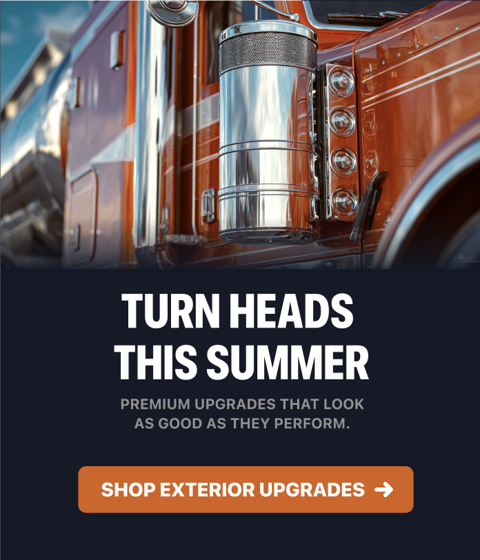 Close-up of a customized orange semi truck with chrome exterior accessories and lighting. Turn Heads This Summer. Premium upgrades that look as good as they perform.