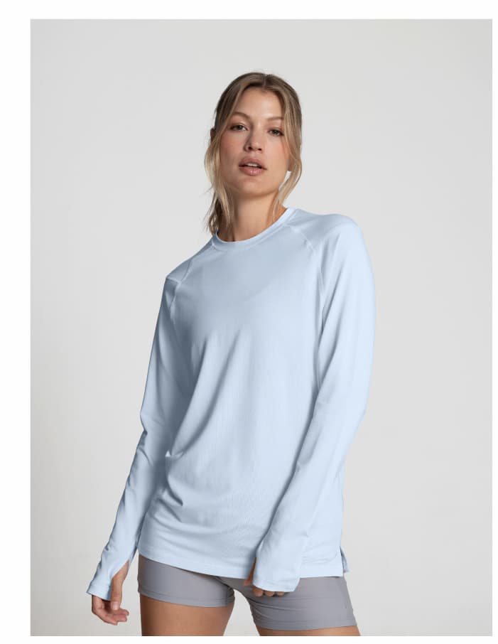 Woman wearing UPF 20+ Bamboo Sun Shirt in River Mist