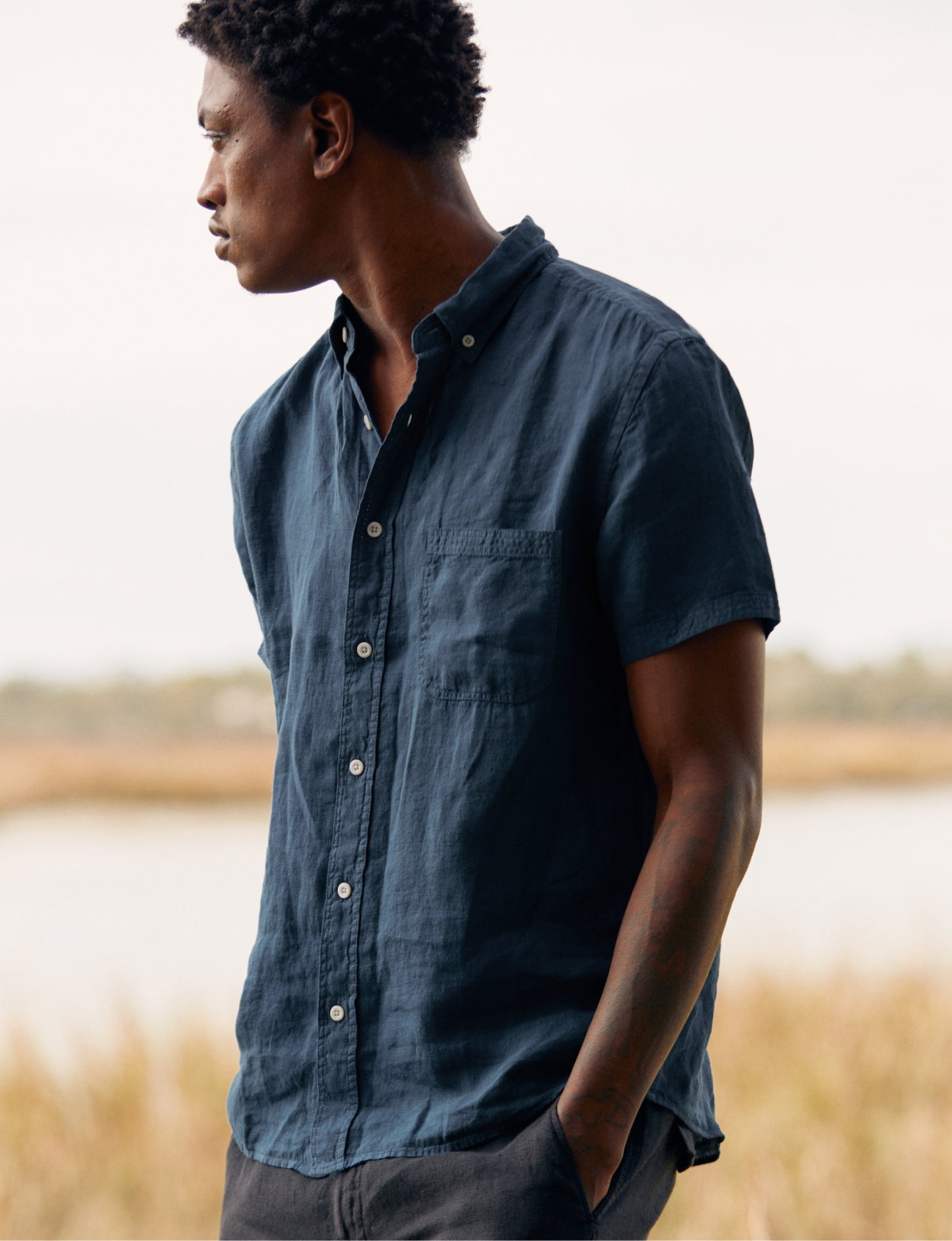 Model wears a Billy Reid linen shirt.
