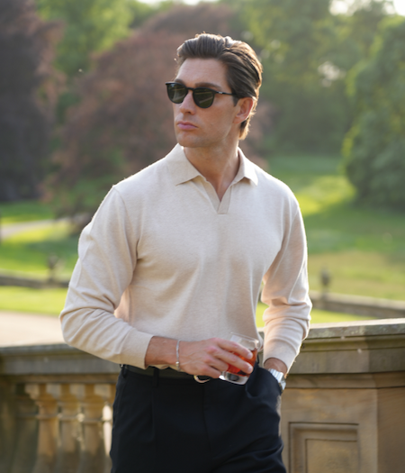 Henry Wade wearing the Men's Padstow Cotton Cashmere Polo Shirt