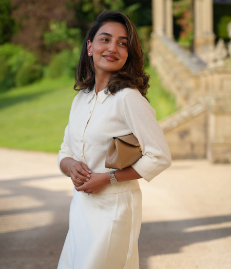 Sonam Naylor wearing the Women's Thea Collared Cashmere Cardigan