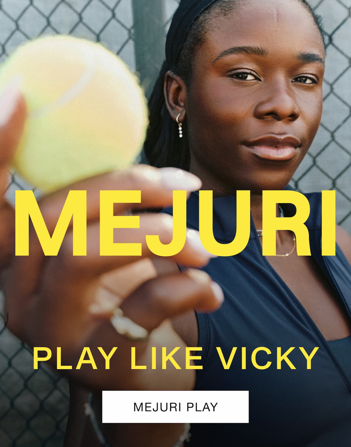 Vicky on a tennis court holding a tennis ball toward the camera wearing a Mejuri diamond drop earring — Mejuri, Playing Like She Means It, Mejuri Play.